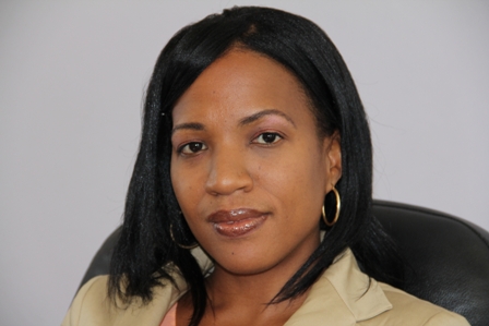 Health Planner in the Nevis Island Administration’s Ministry of Health and member of the MUA/NIA Scholarship Committee Mrs. Nicole Slack-Liburd announcing the Scholarships at the Nevis Island Administrations’ conference room in Charlestown